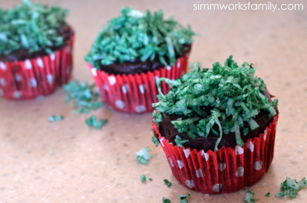 Easter Egg Cupcake Baskets adding grass