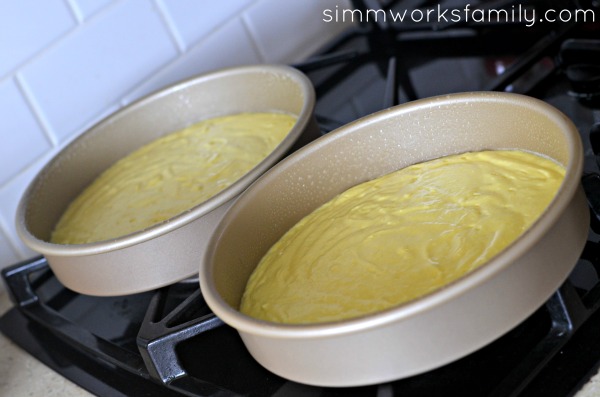 Ginger Ale Lemon Cake fill pans