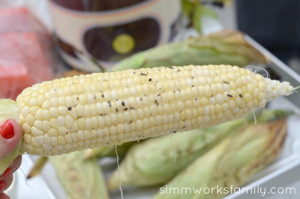 corn on the cob with herb butter ready to eat