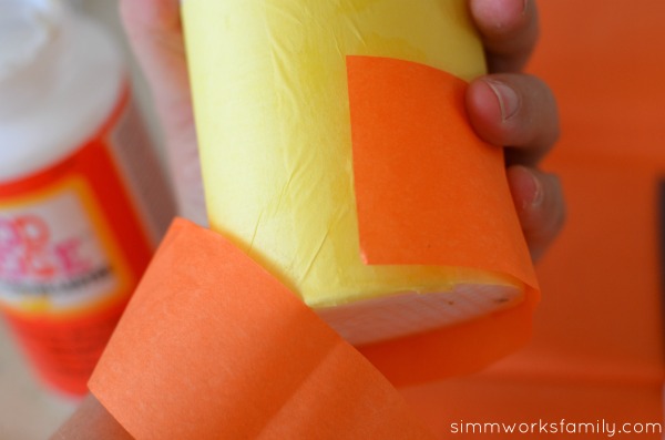 DIY Candy Corn Candles apply tissue paper