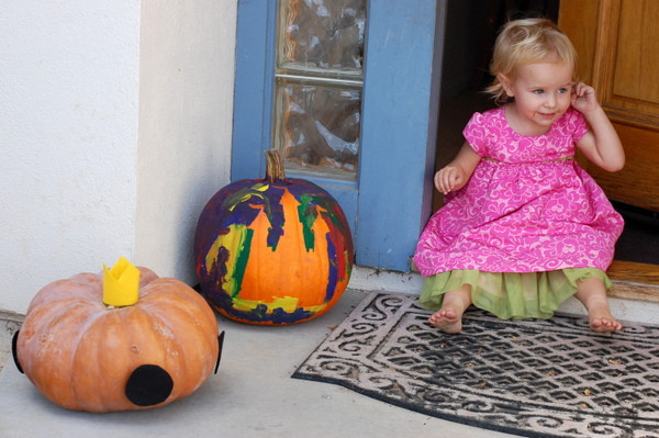 Painting Pumpkin on Doorstep