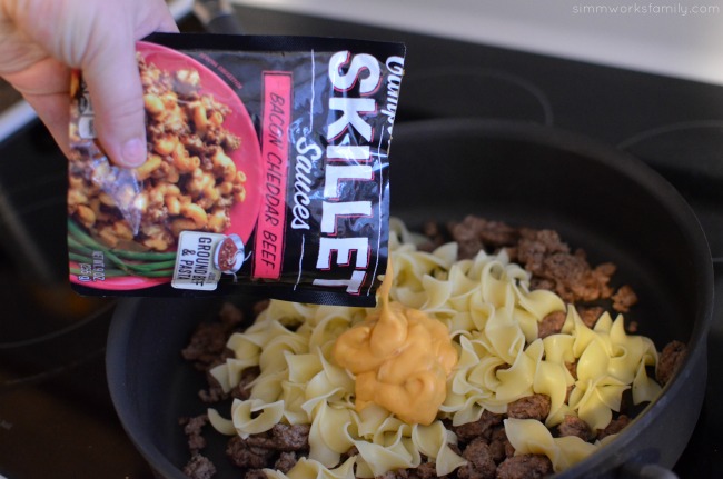 Easy Dinner Solutions for the Busy Mom - mixing beef, noodles, and sauce #CampbellsSauces 