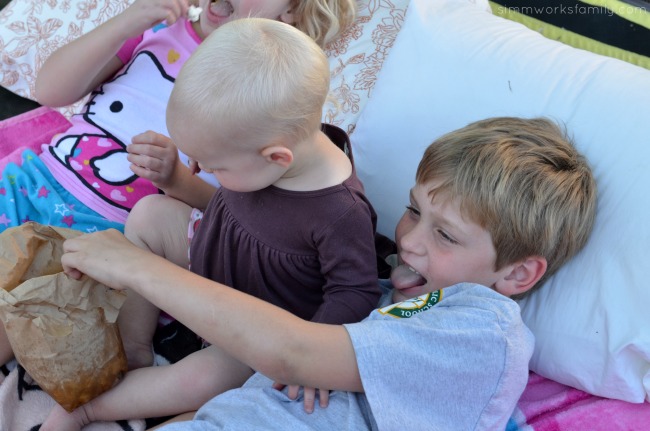 5 Reasons To Be Thankful For Summer + an outdoor movie night idea on a trampoline with siblings