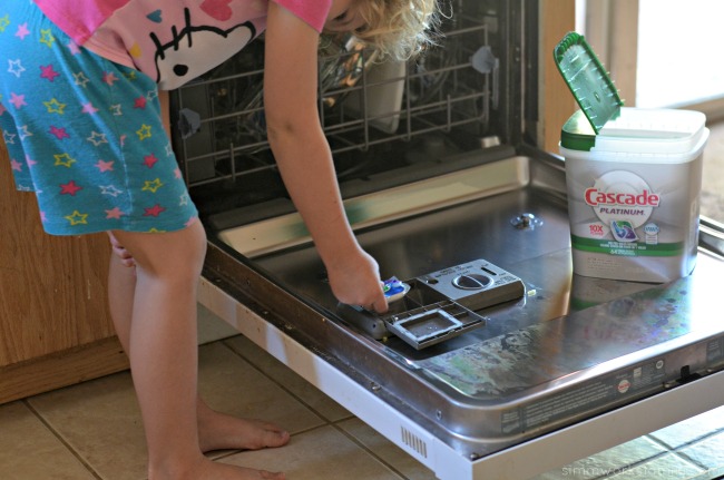 Trading Clean Time for Screen Time This Summer doing the dishes