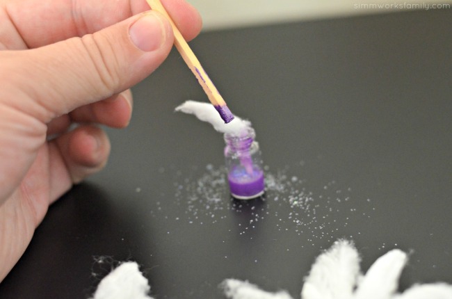 DIY Nebula in a Jar Necklace - use a stick to add paint and cotton ball