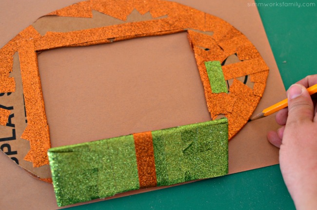 diy-football-photo-frame-trace-out-construction-paper-for-covering-back-of-frame